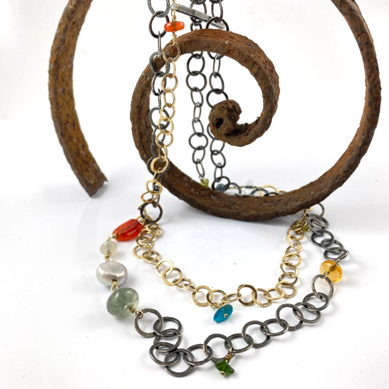 ringetjes-collier-lang-edelstenen-zilver-gezwart-geel-goud